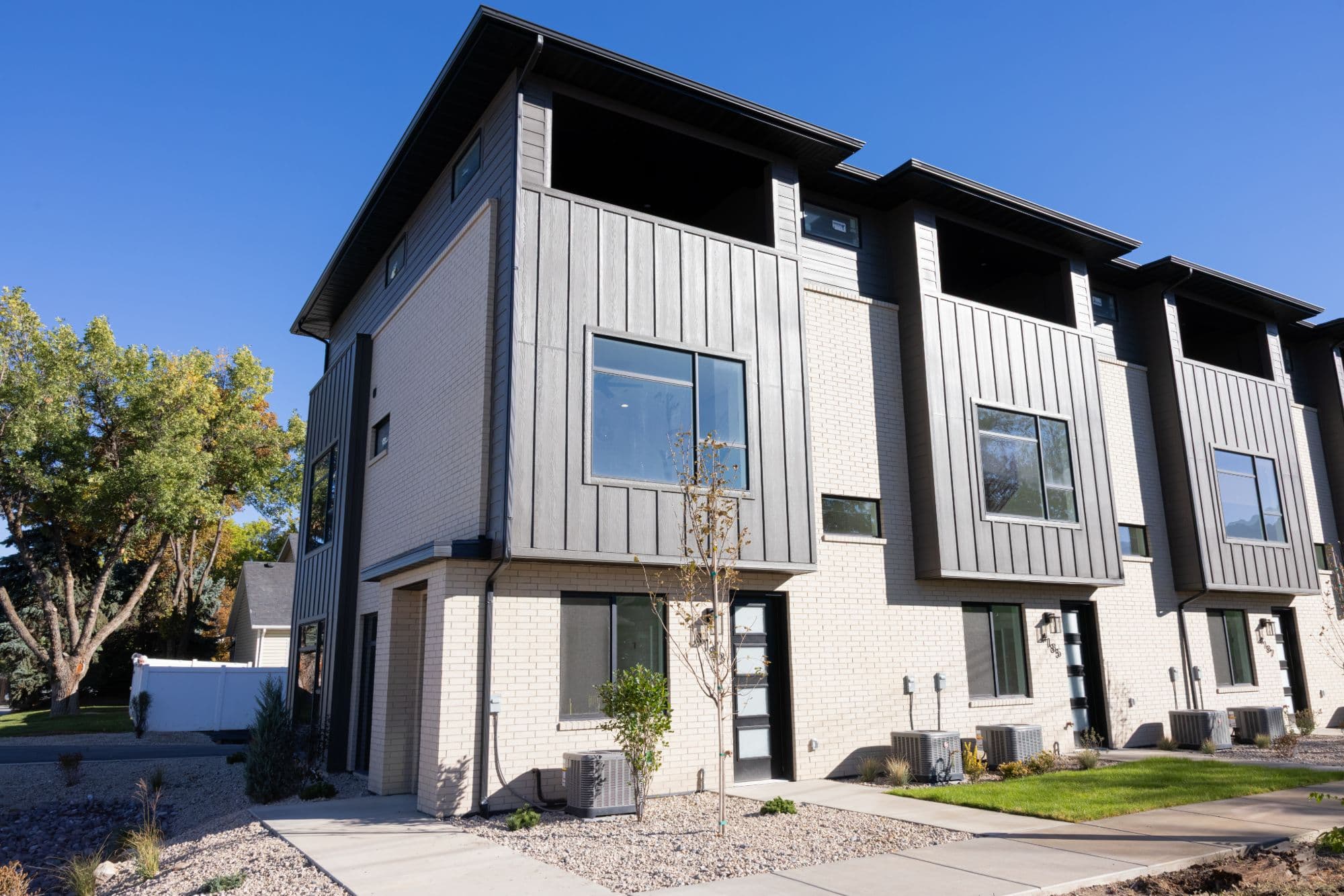 The Preserve on 9th — corner view of the townhome row